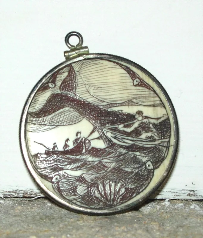 Ivory scrimshaw medallion in silver elephant ivory 2 in. dia